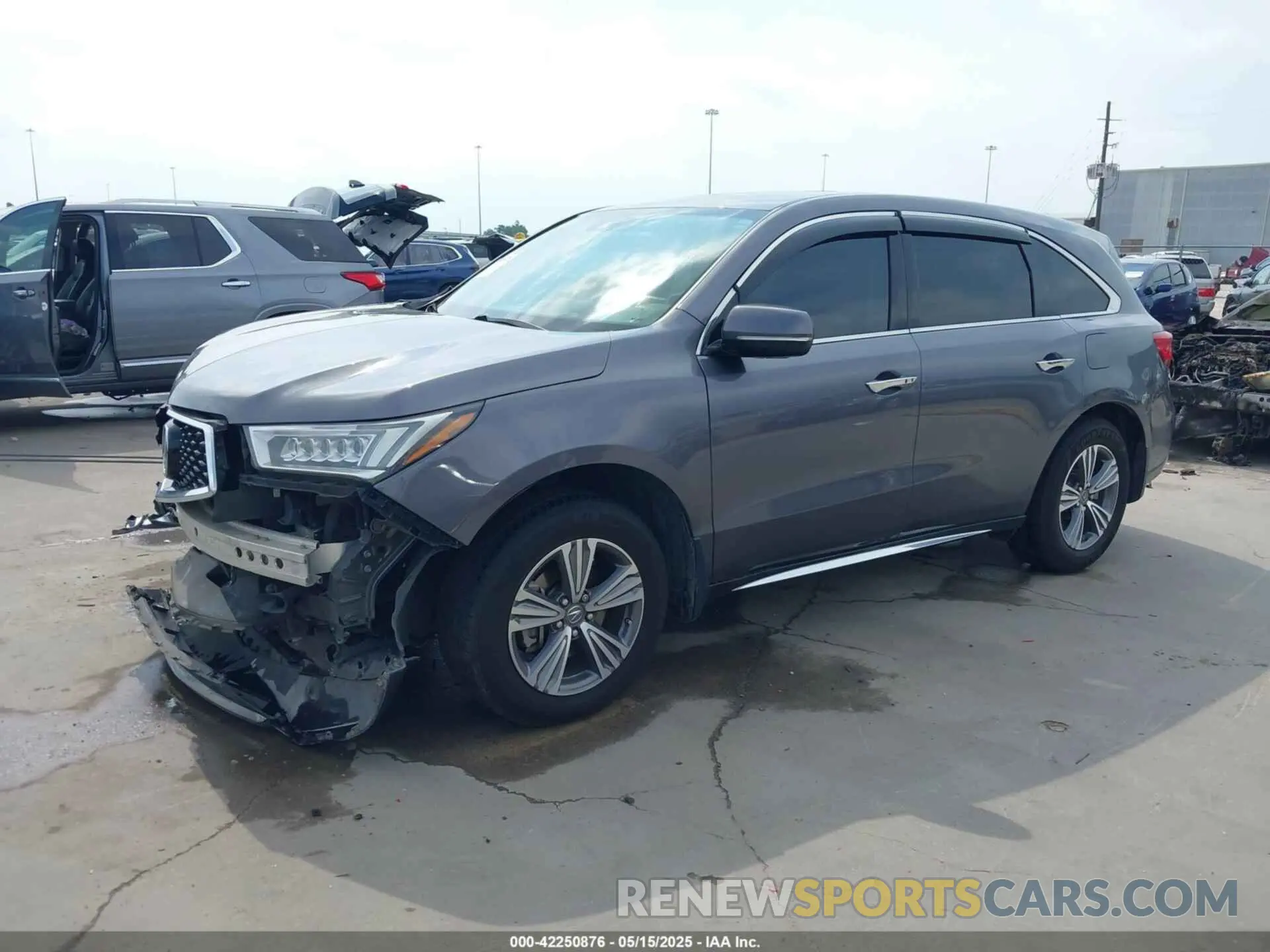 2 fotografías del automóvil dañado 5J8YD3H35KL012798 ACURA MDX 2019