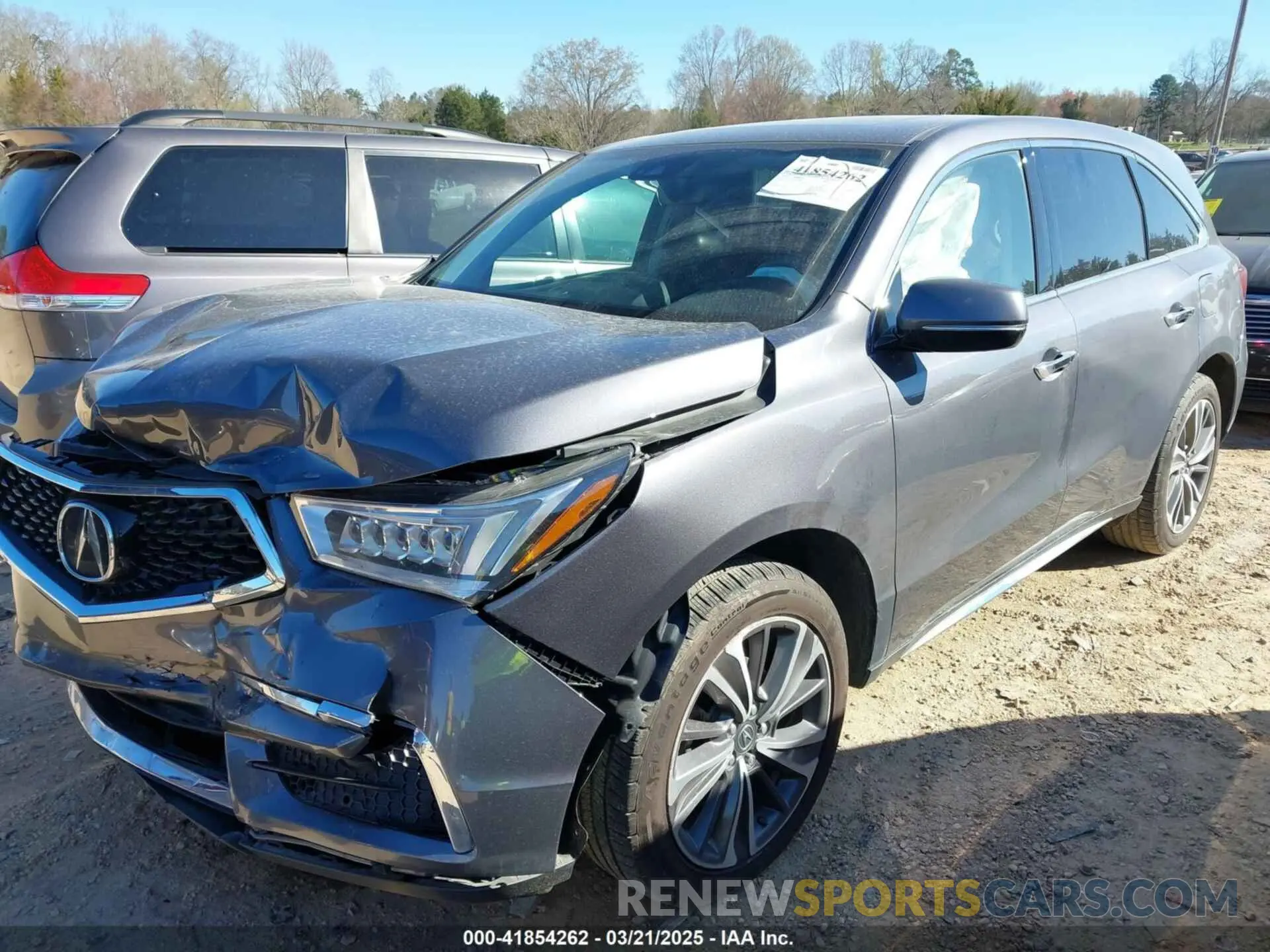 2 fotografías del automóvil dañado 5J8YD3H58KL011856 ACURA MDX 2019