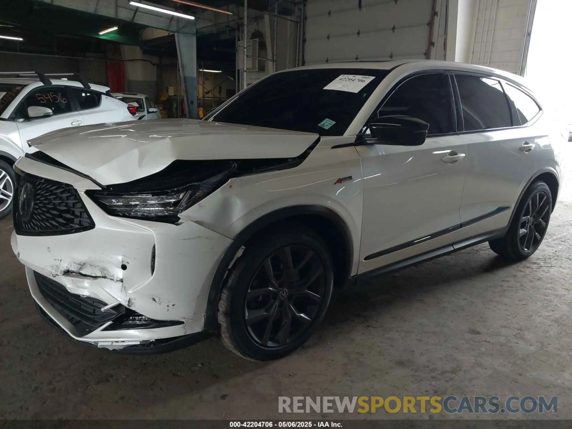 2 fotografías del automóvil dañado 5J8YE1H06NL038869 ACURA MDX 2022