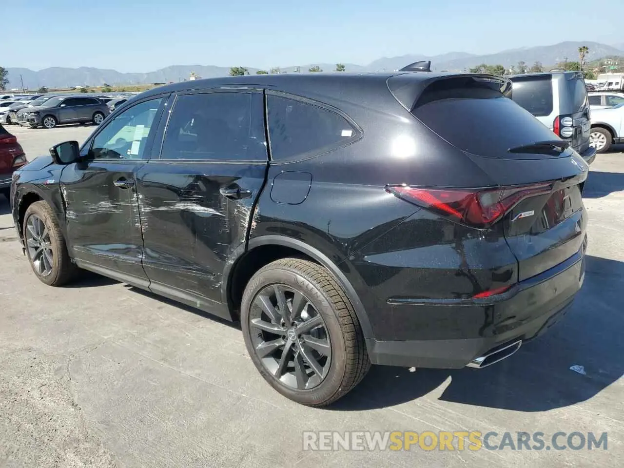 2 fotografías del automóvil dañado 5J8YE1H06SL010596 ACURA MDX 2025