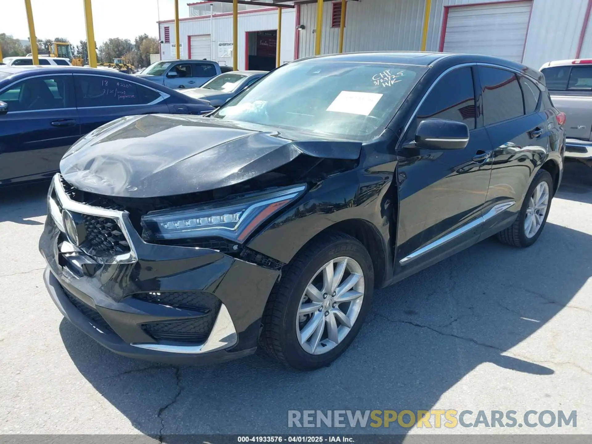 2 fotografías del automóvil dañado 5J8TC1H33ML006504 ACURA RDX 2021