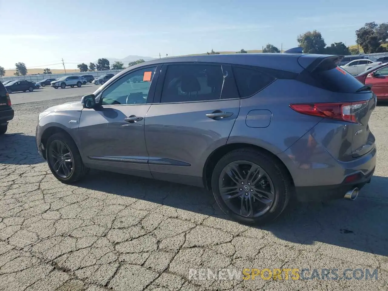 2 fotografías del automóvil dañado 5J8TC2H69ML010461 ACURA RDX 2021