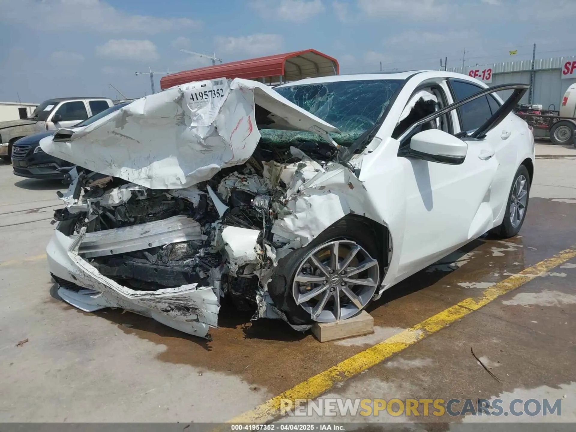 2 fotografías del automóvil dañado 19UUB1F51KA000835 ACURA TLX 2019