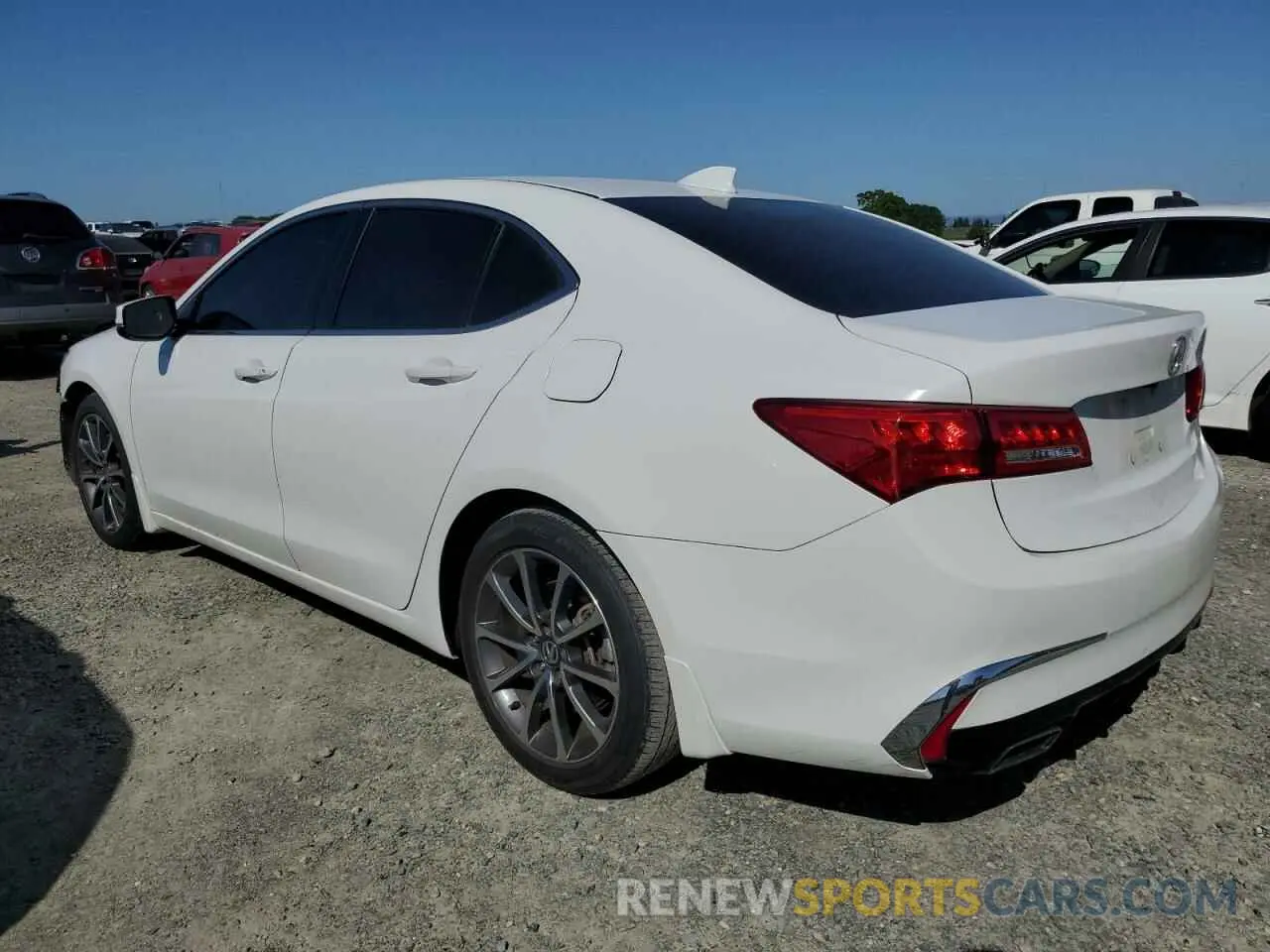 2 fotografías del automóvil dañado 19UUB2F34KA001658 ACURA TLX 2019