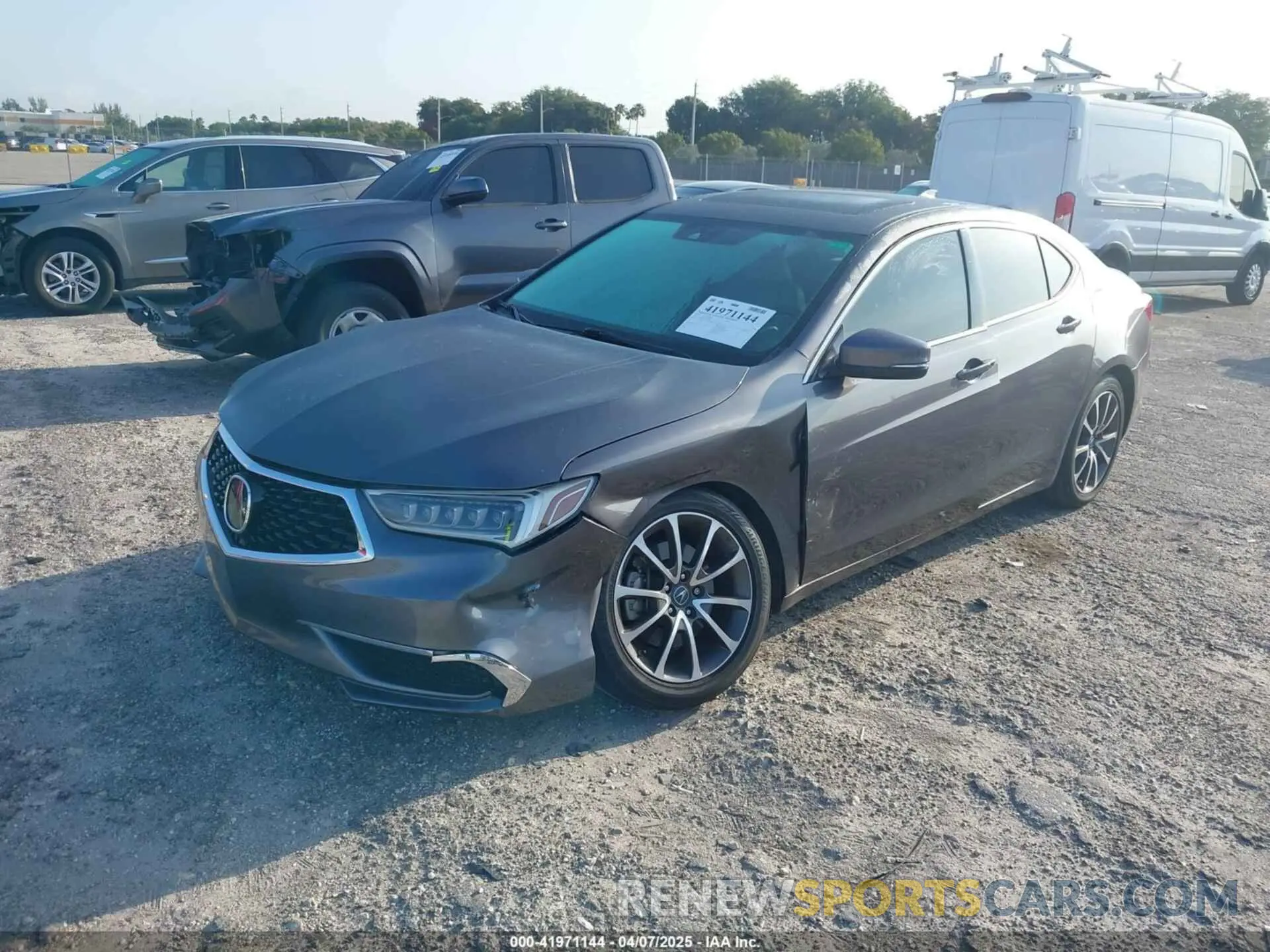 2 fotografías del automóvil dañado 19UUB2F39KA004586 ACURA TLX 2019