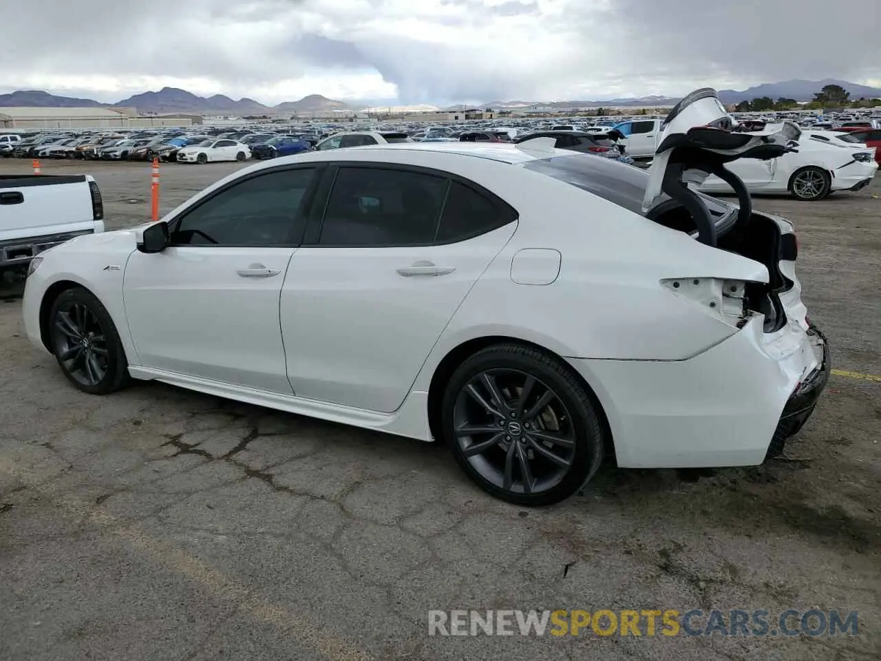 2 fotografías del automóvil dañado 19UUB2F66KA001204 ACURA TLX 2019