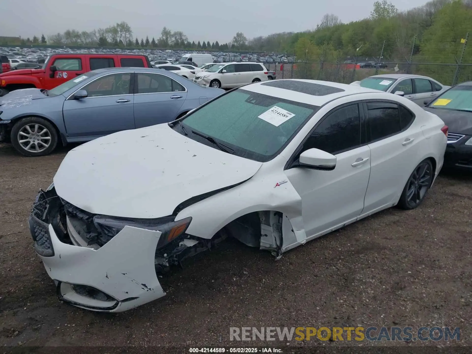 2 fotografías del automóvil dañado 19UUB3F63KA800671 ACURA TLX 2019