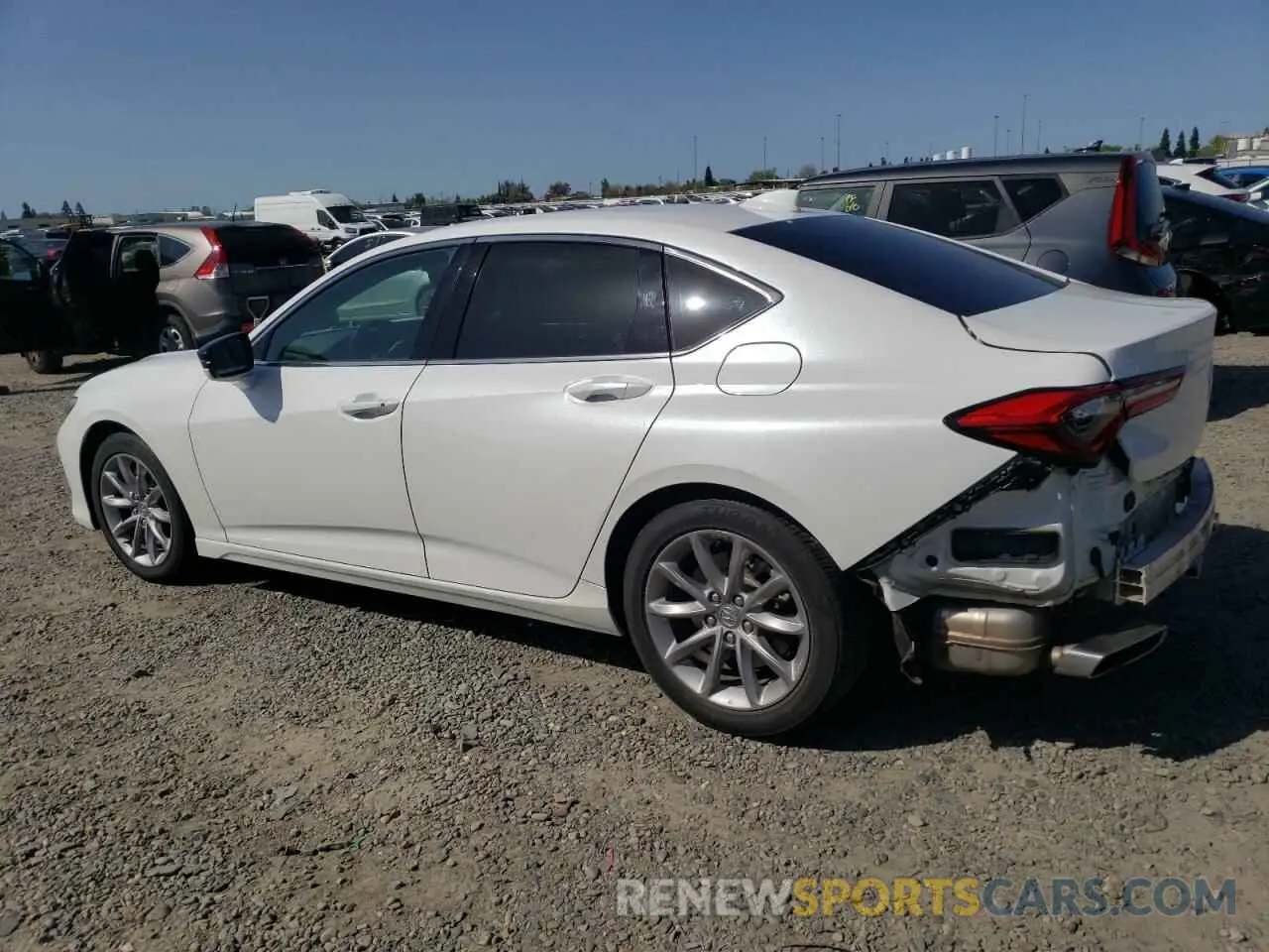 2 fotografías del automóvil dañado 19UUB5F31MA002383 ACURA TLX 2021