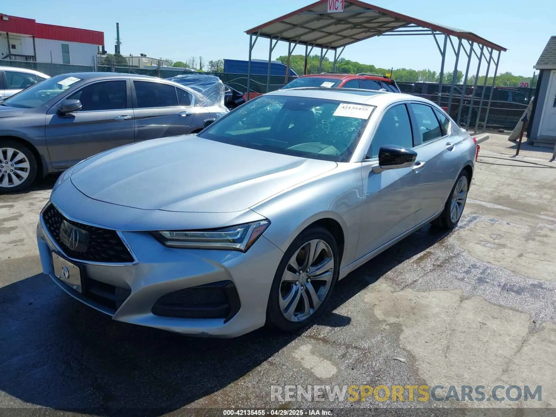 2 fotografías del automóvil dañado 19UUB5F48MA007055 ACURA TLX 2021