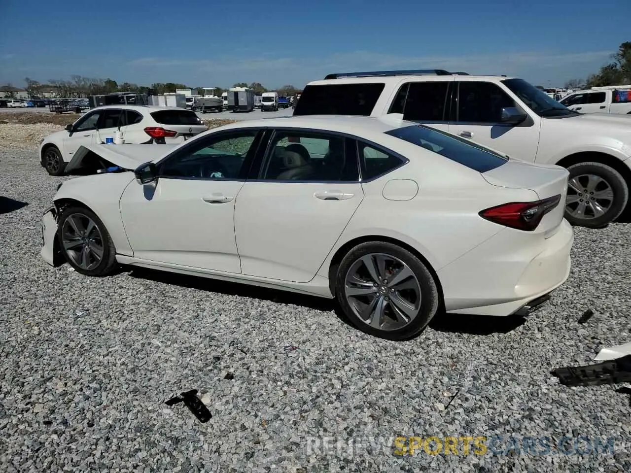 2 fotografías del automóvil dañado 19UUB5F62MA003777 ACURA TLX 2021