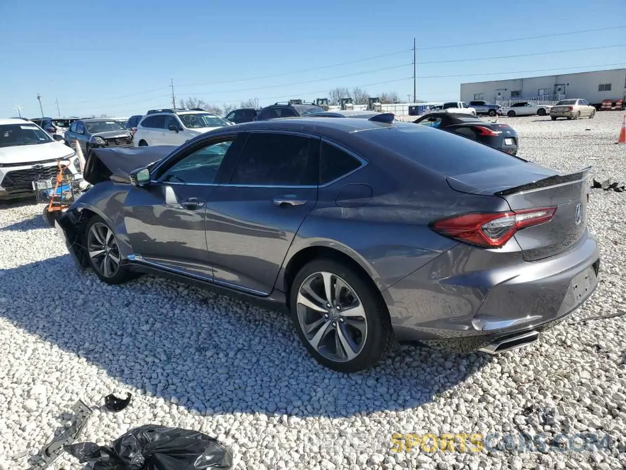 2 fotografías del automóvil dañado 19UUB5F66MA000476 ACURA TLX 2021