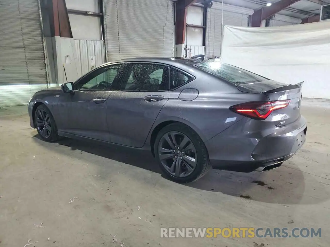 2 fotografías del automóvil dañado 19UUB5F51NA002631 ACURA TLX 2022
