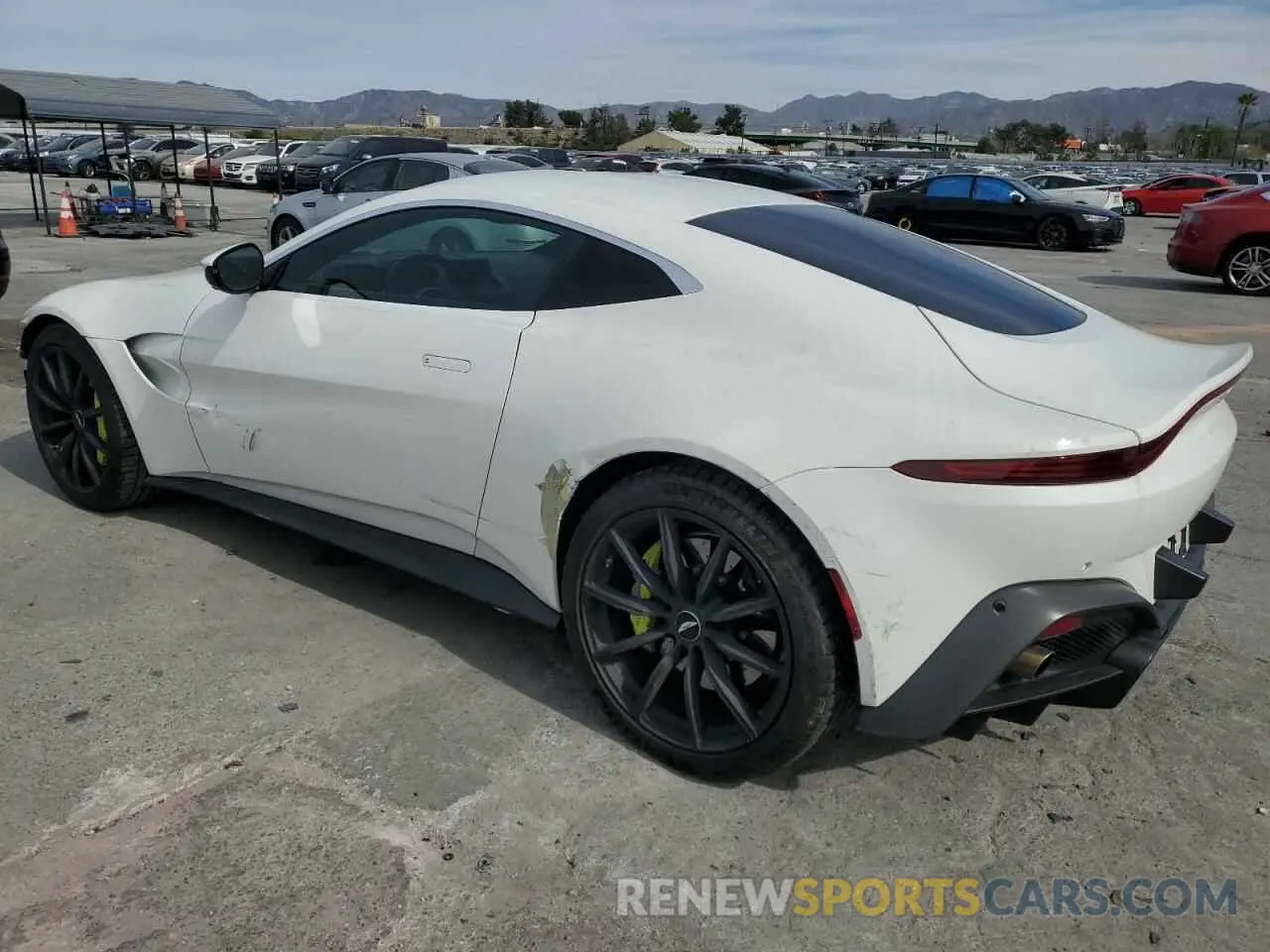 2 fotografías del automóvil dañado SCFSMGAW2KGN01086 ASTON MARTIN ALL MODELS 2019