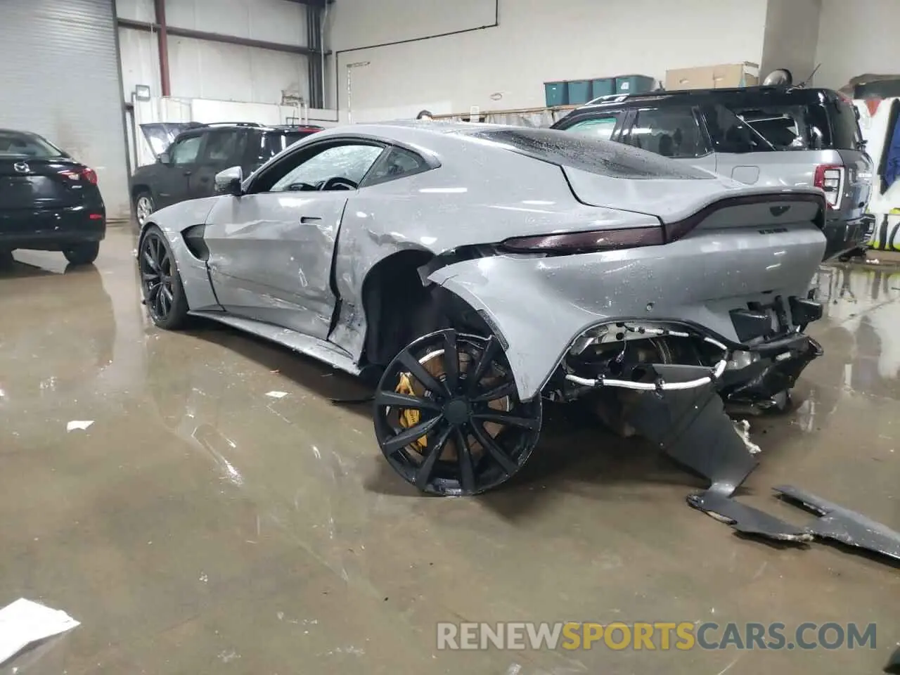 2 fotografías del automóvil dañado SCFSMGAW7KGN02038 ASTON MARTIN ALL MODELS 2019