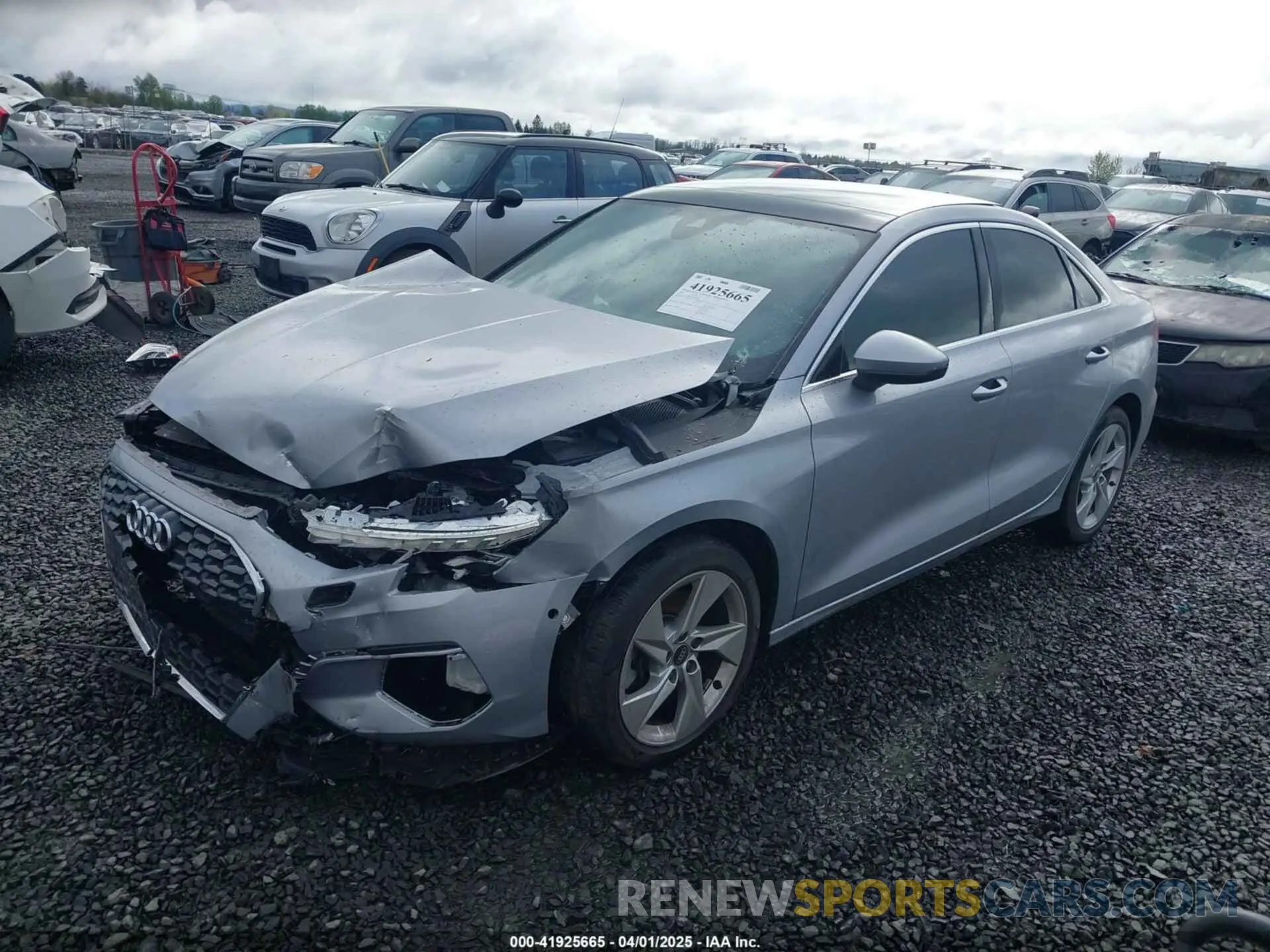 2 fotografías del automóvil dañado WAUAUDGYXPA062020 AUDI A3 2023