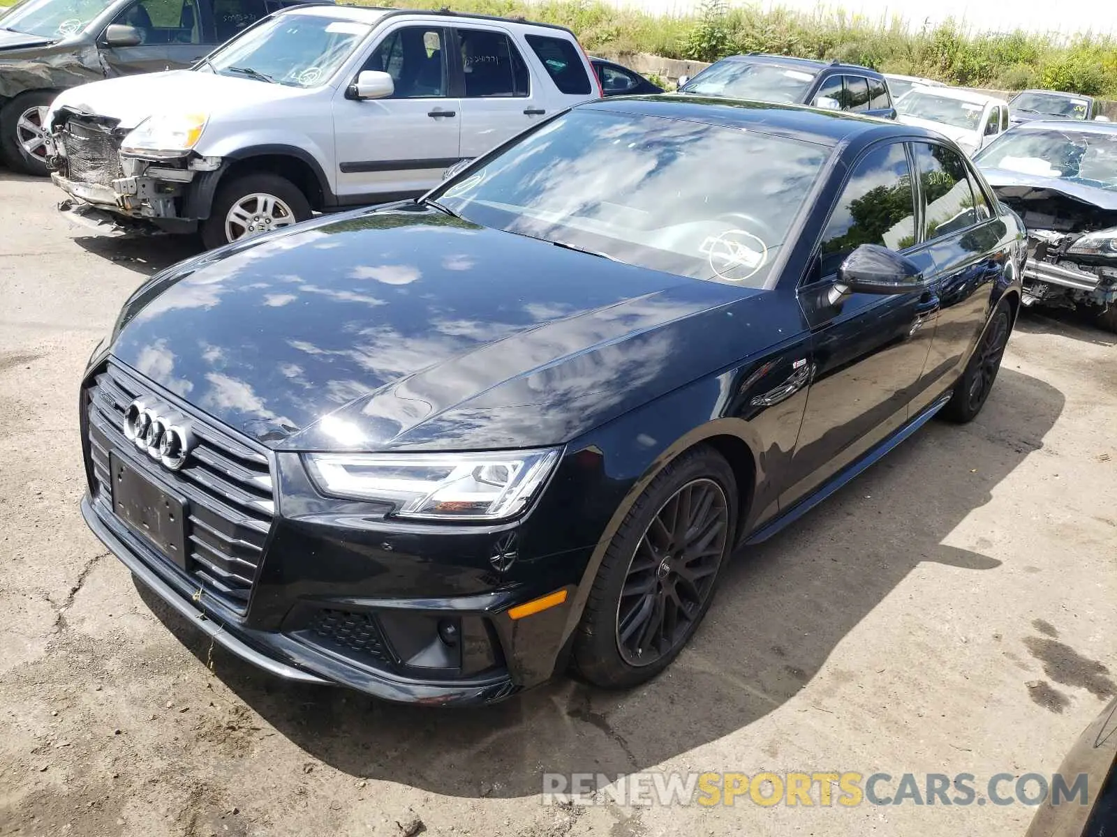 2 fotografías del automóvil dañado WAUENAF4XKA013842 AUDI A4 2019