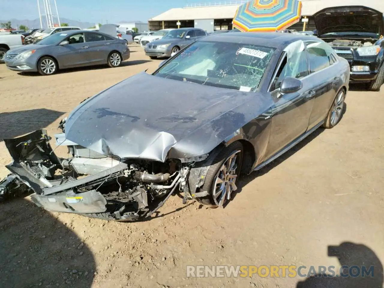 2 fotografías del automóvil dañado WAUEAAF41NN007615 AUDI A4 2022