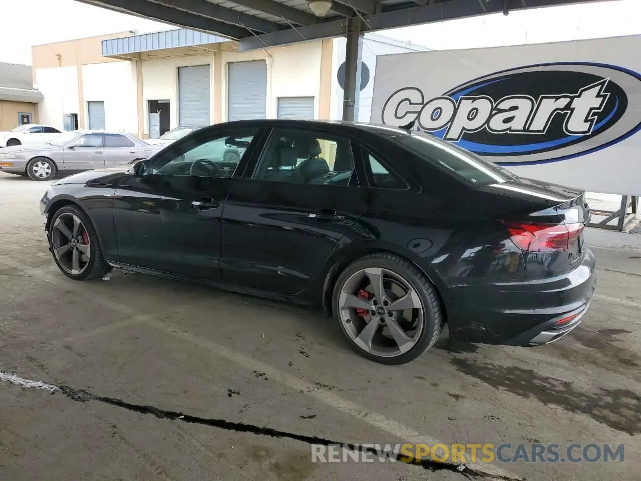 2 fotografías del automóvil dañado WAUEAAF46NN006492 AUDI A4 2022