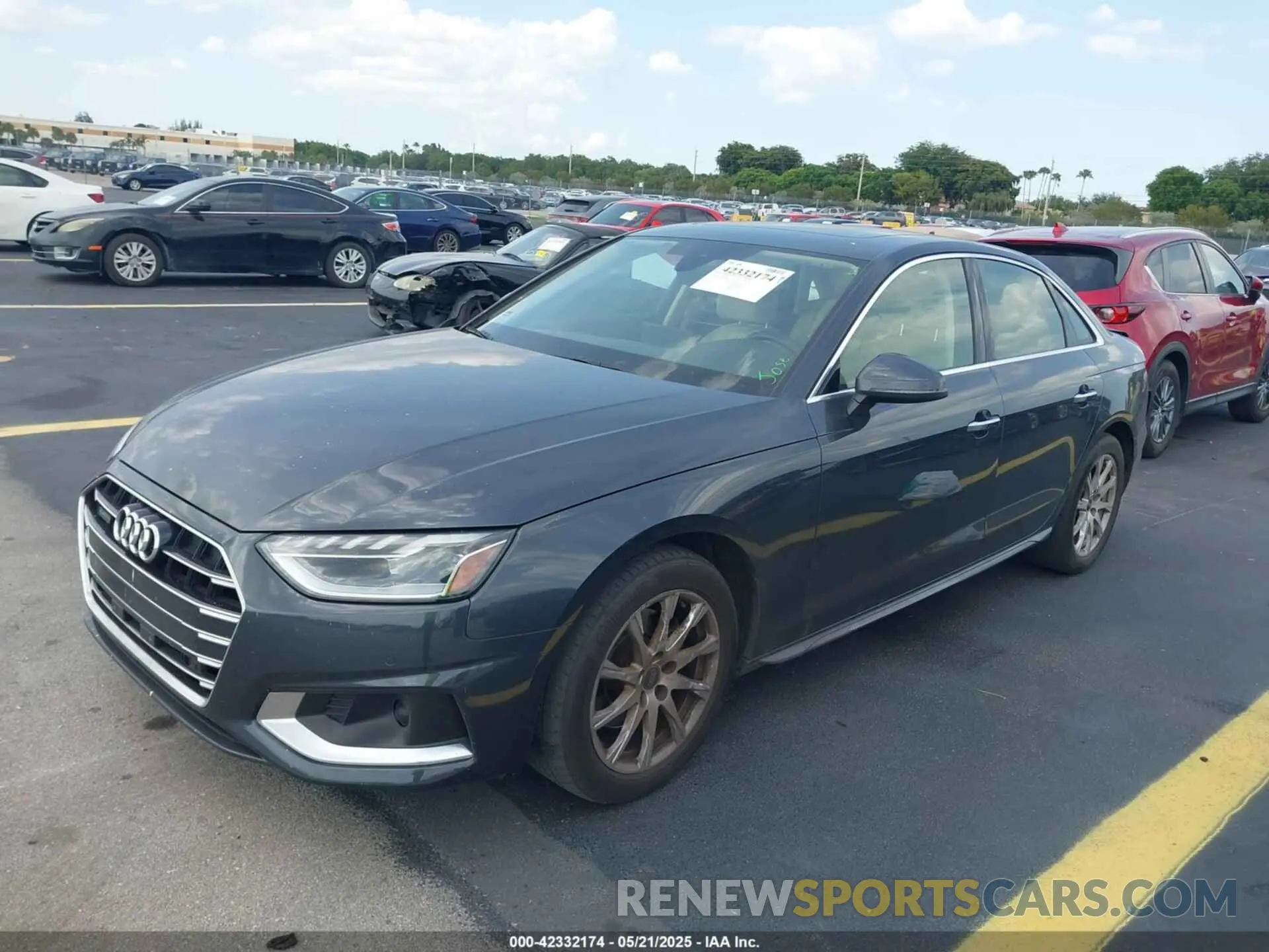 2 fotografías del automóvil dañado WAUABAF44PN004836 AUDI A4 2023