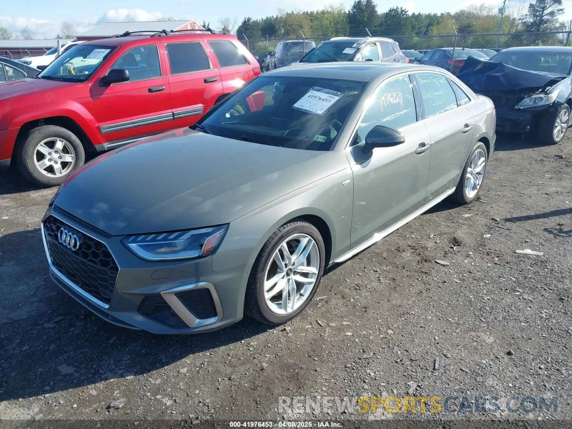 2 fotografías del automóvil dañado WAUFABF43PN008858 AUDI A4 2023