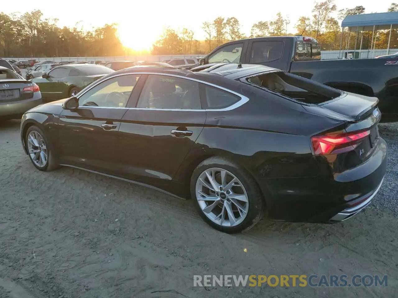 2 fotografías del automóvil dañado WAUCBCF55PA008902 AUDI A5 2023