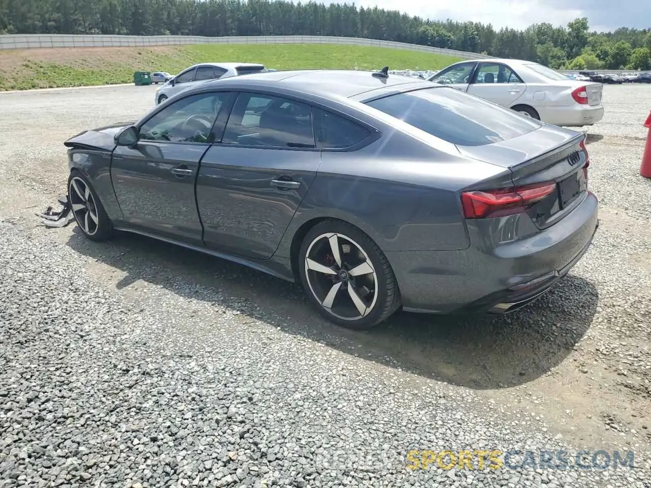 2 fotografías del automóvil dañado WAUFACF55PA055301 AUDI A5 2023