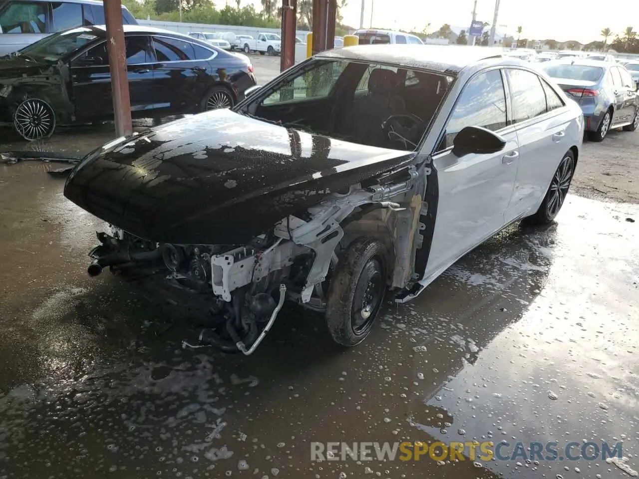 2 fotografías del automóvil dañado WAUD3AF26MN069563 AUDI A6 2021