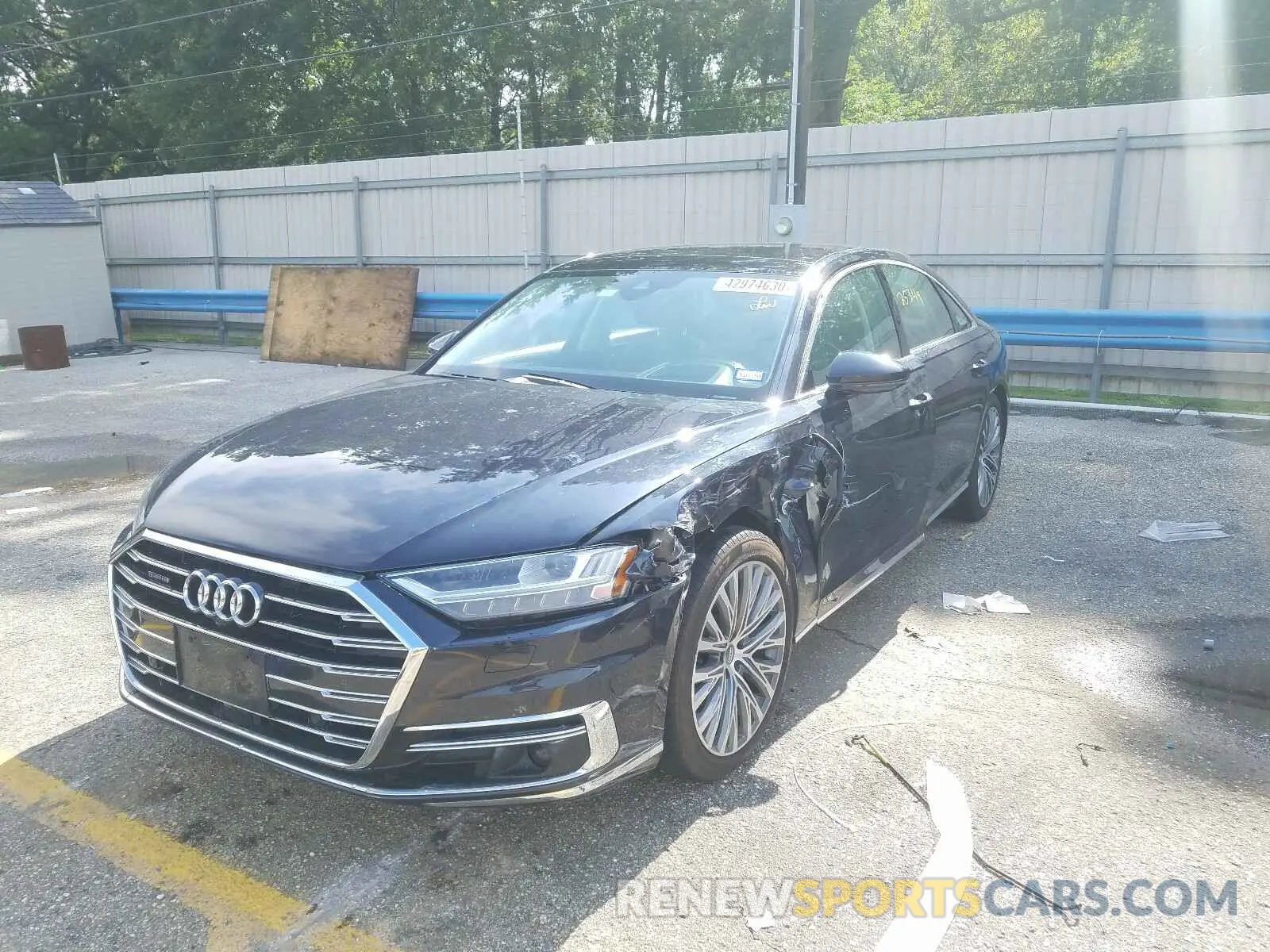 2 fotografías del automóvil dañado WAU8DAF85KN003084 AUDI A8 2019