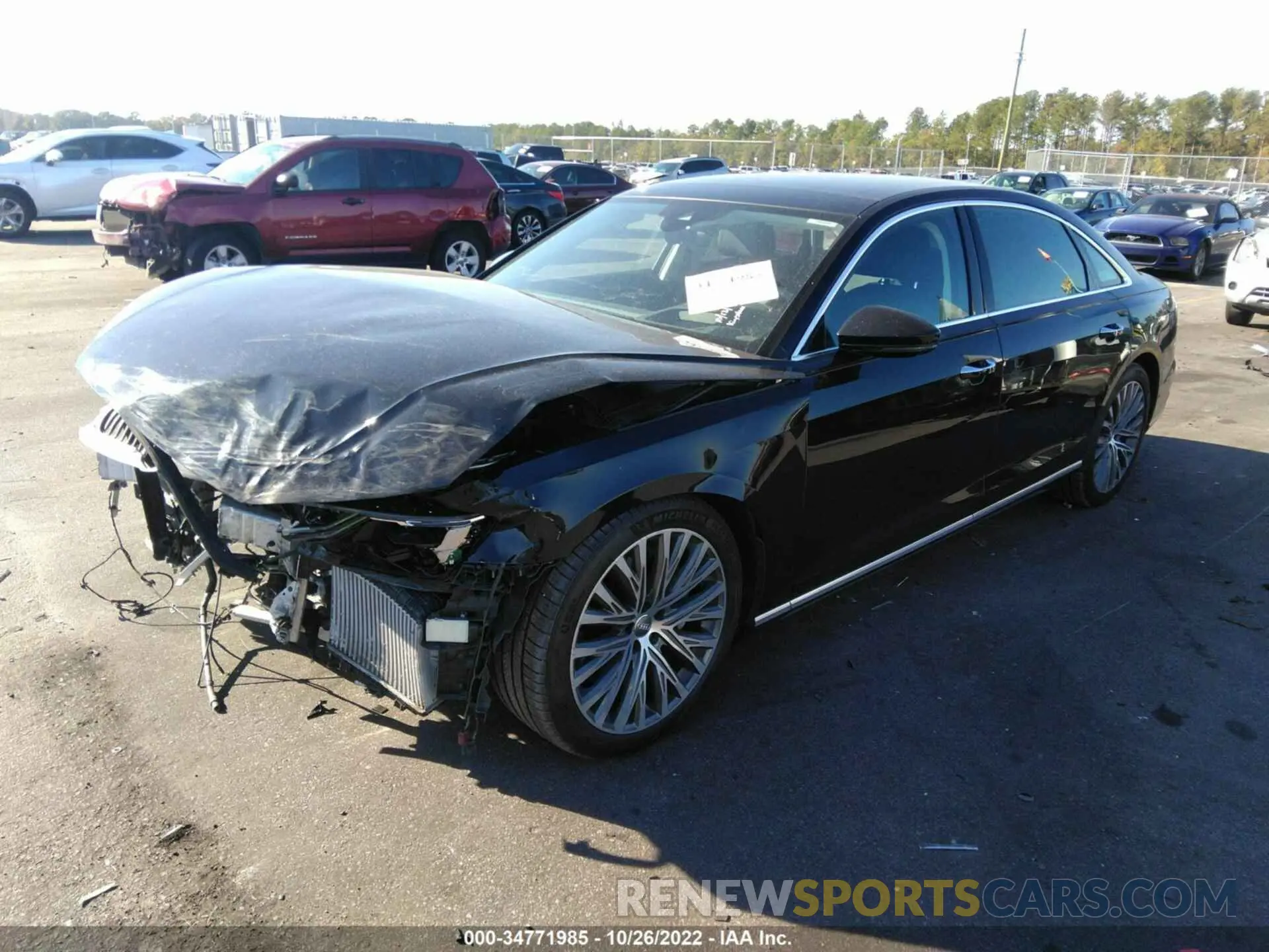 2 fotografías del automóvil dañado WAU8DAF88KN014774 AUDI A8 2019