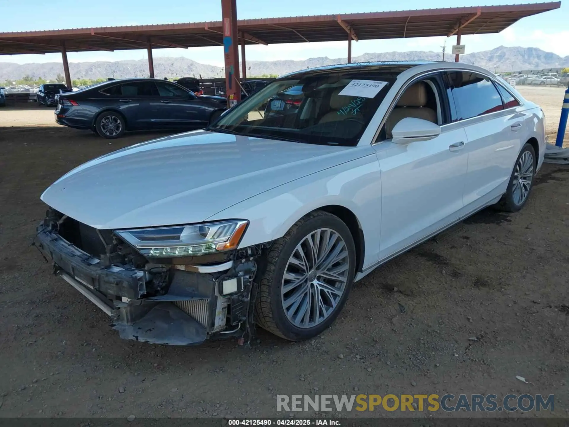 2 fotografías del automóvil dañado WAU8DAF83KN006128 AUDI A8 L 2019
