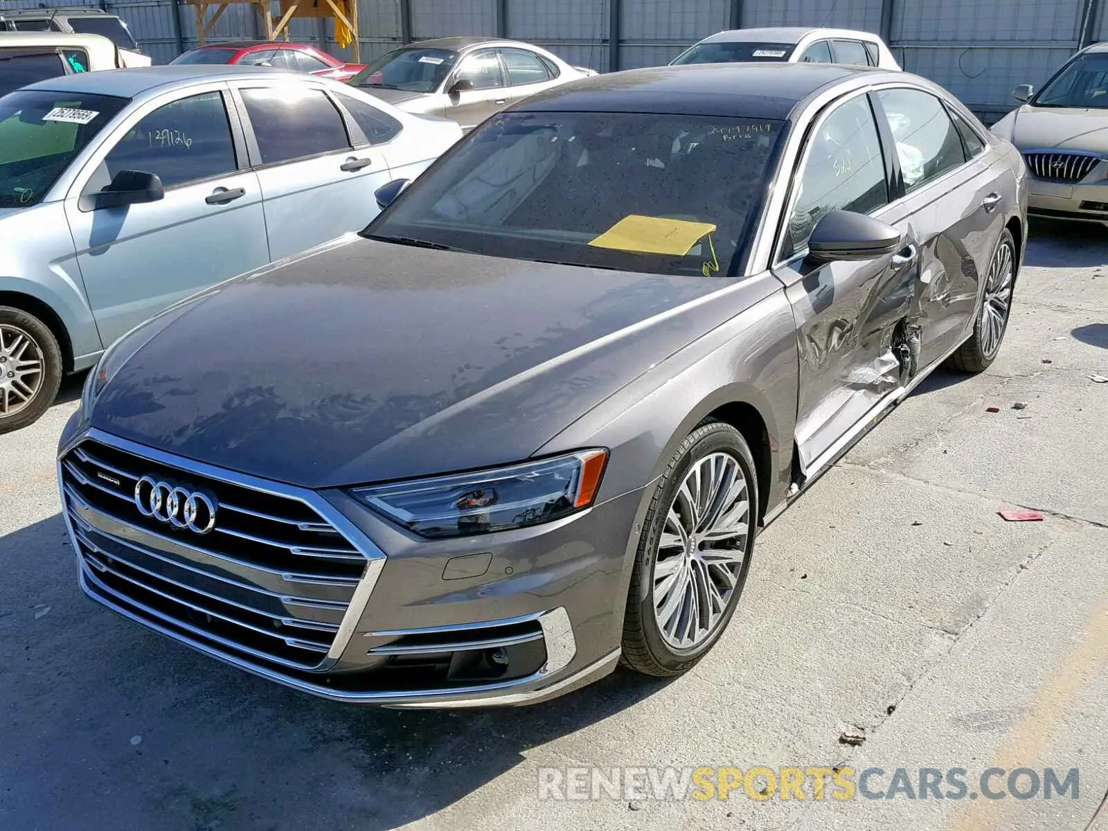 2 fotografías del automóvil dañado WAU8DAF86KN004762 AUDI A8 L 2019