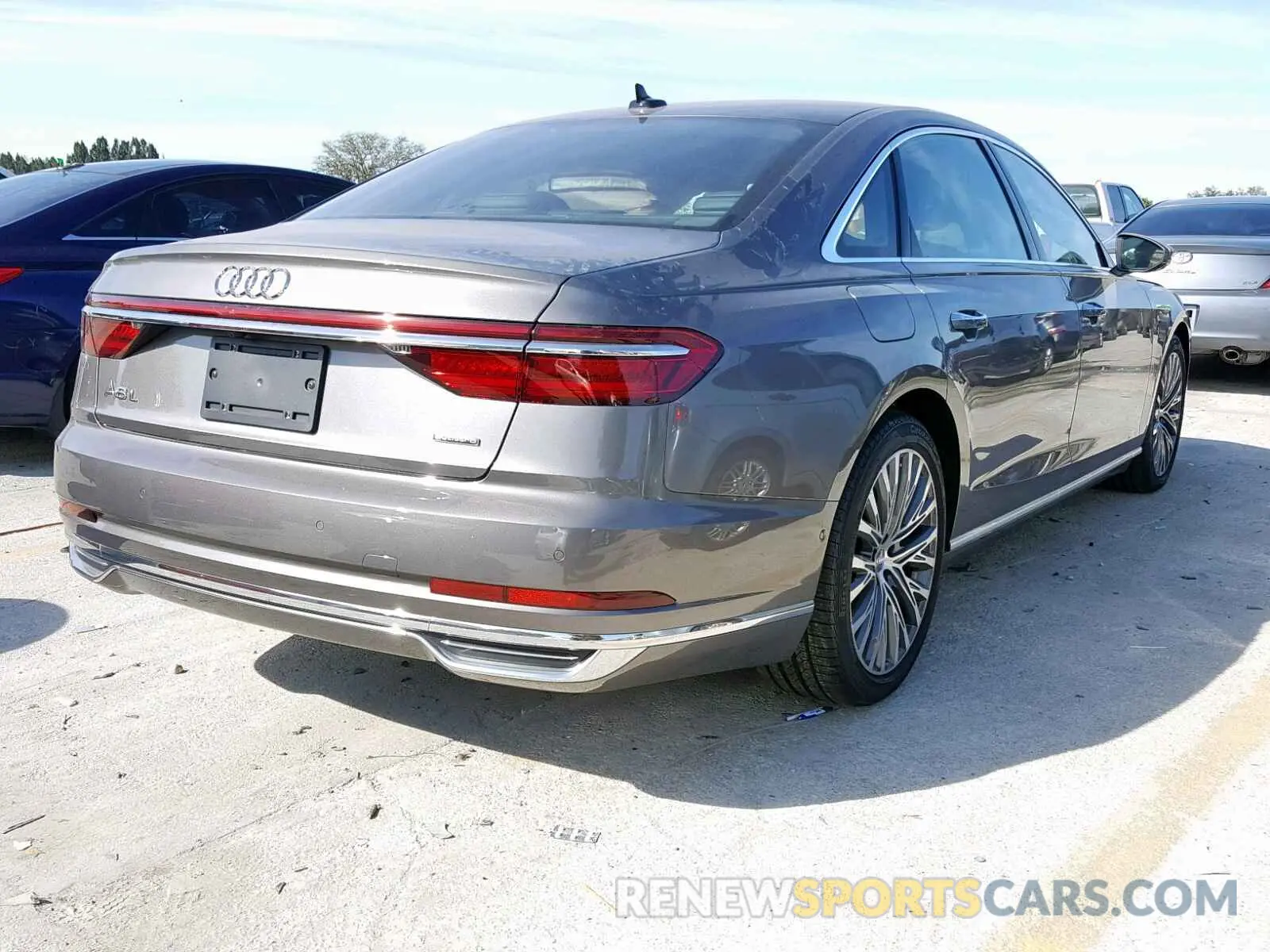 4 fotografías del automóvil dañado WAU8DAF86KN004762 AUDI A8 L 2019