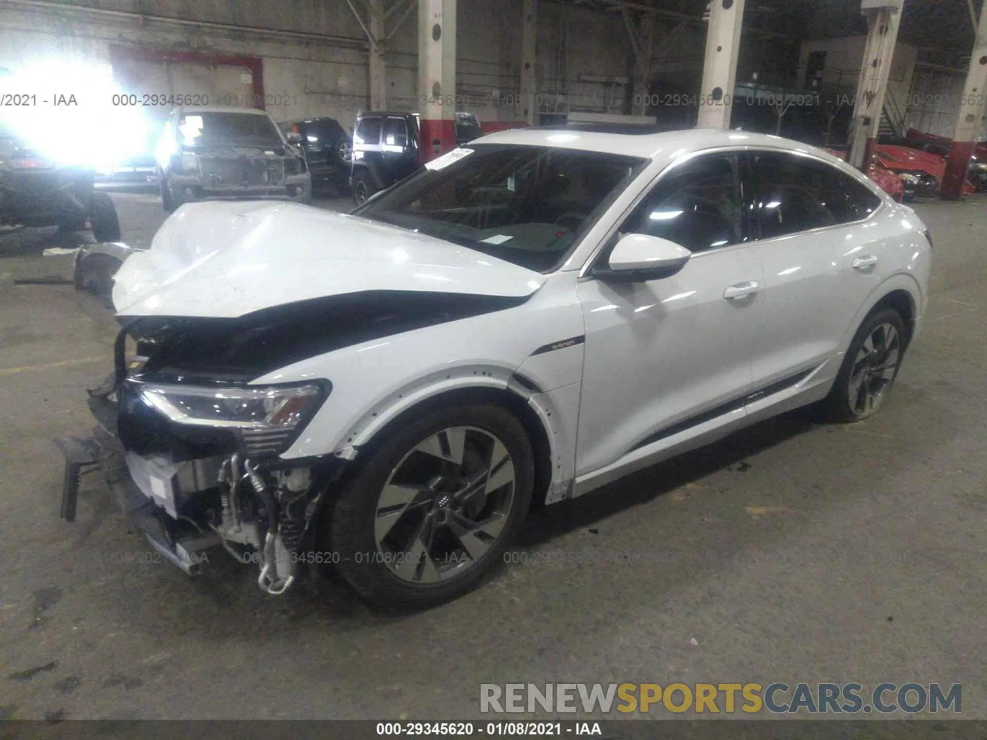 2 fotografías del automóvil dañado WA11AAGE9MB001466 AUDI E-TRON 2020