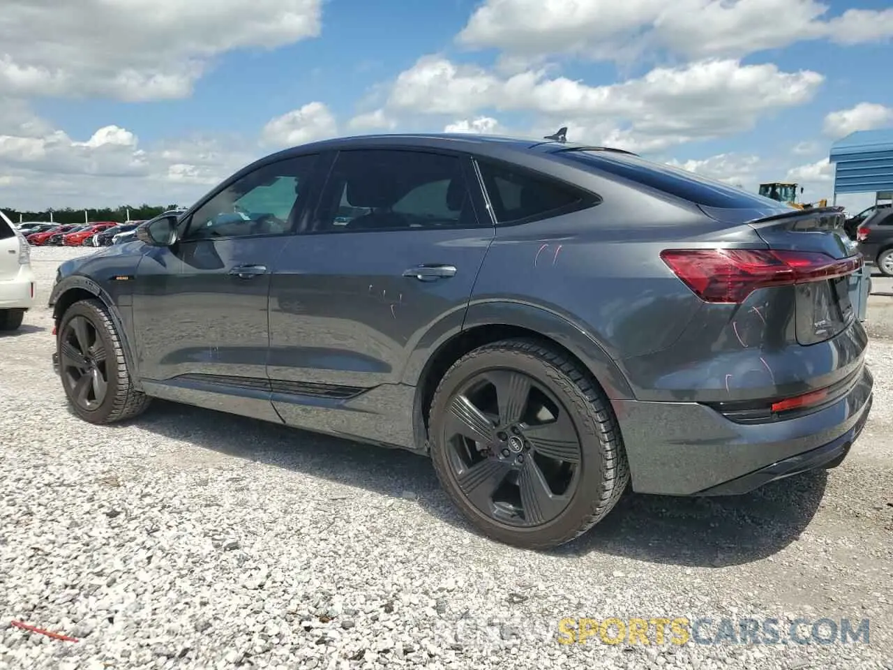 2 fotografías del automóvil dañado WA12AAGE1MB039861 AUDI E-TRON 2021