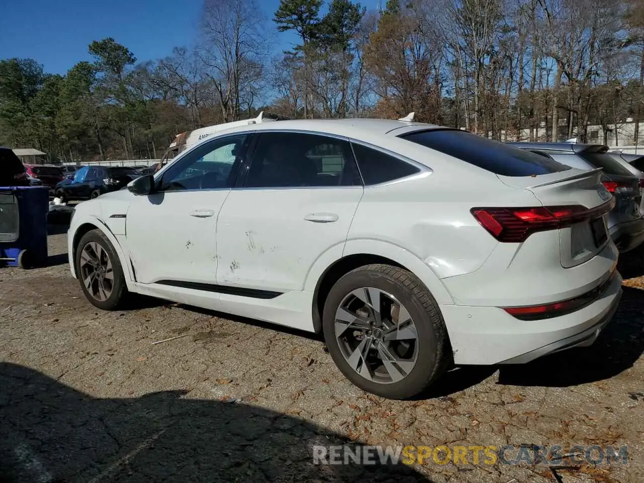 2 fotografías del automóvil dañado WA12AAGE8PB007462 AUDI E-TRON 2023