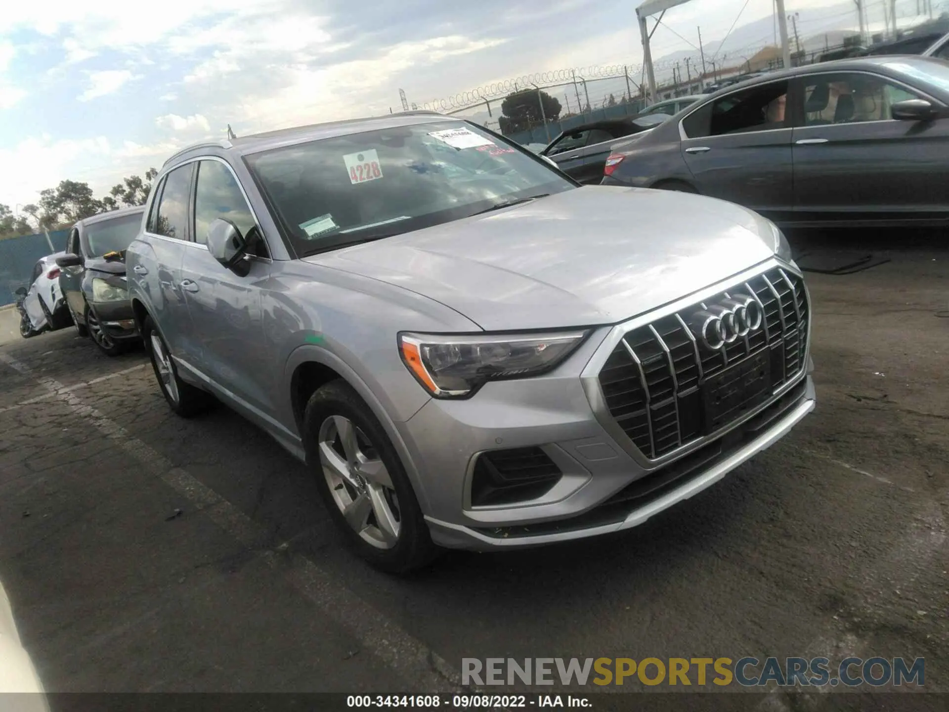 2 fotografías del automóvil dañado WA1AECF38K1086920 AUDI Q3 2019
