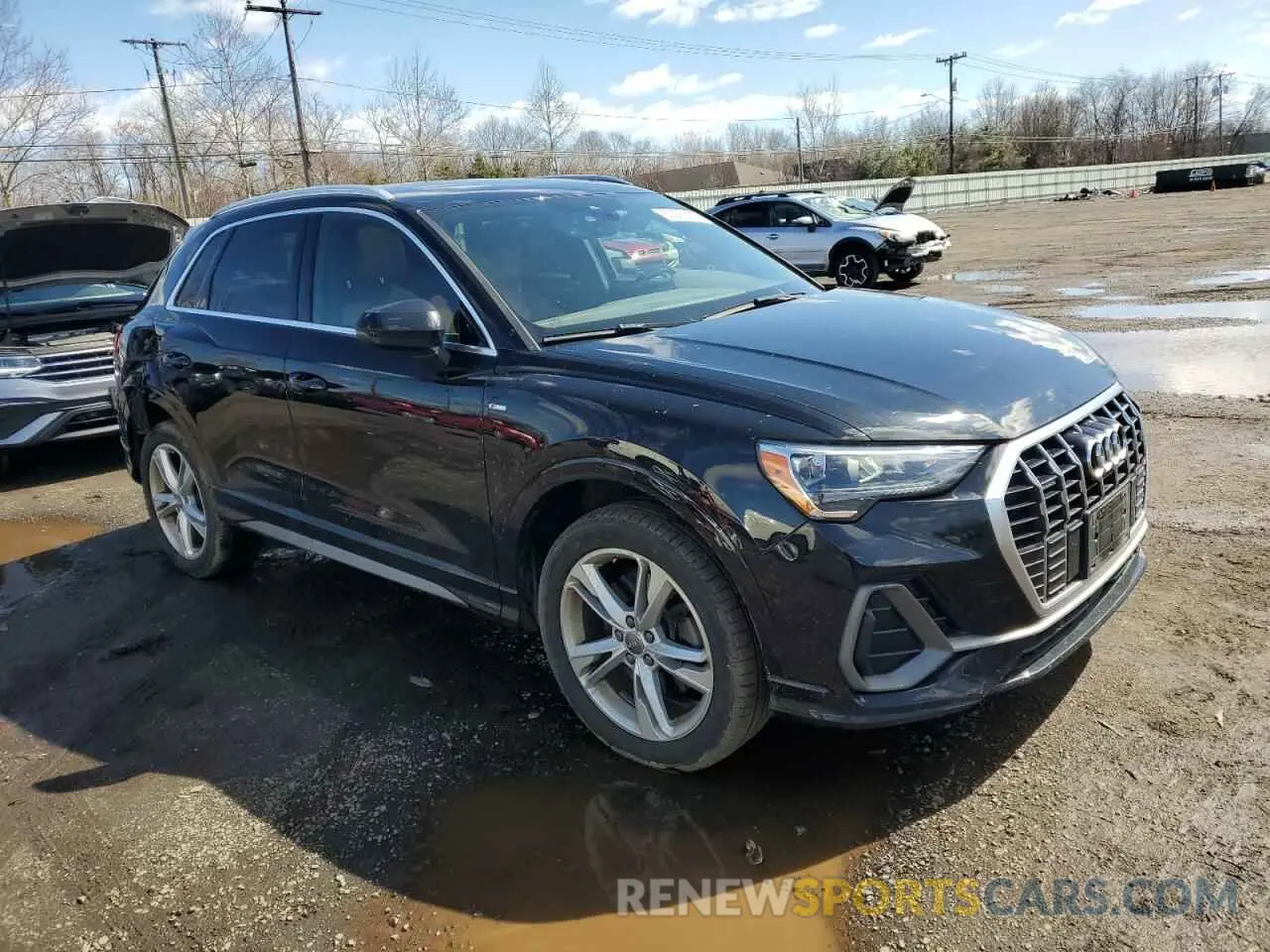 4 fotografías del automóvil dañado WA1DECF35K1083132 AUDI Q3 2019