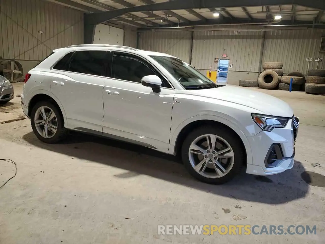 4 fotografías del automóvil dañado WA1EECF30K1064220 AUDI Q3 2019