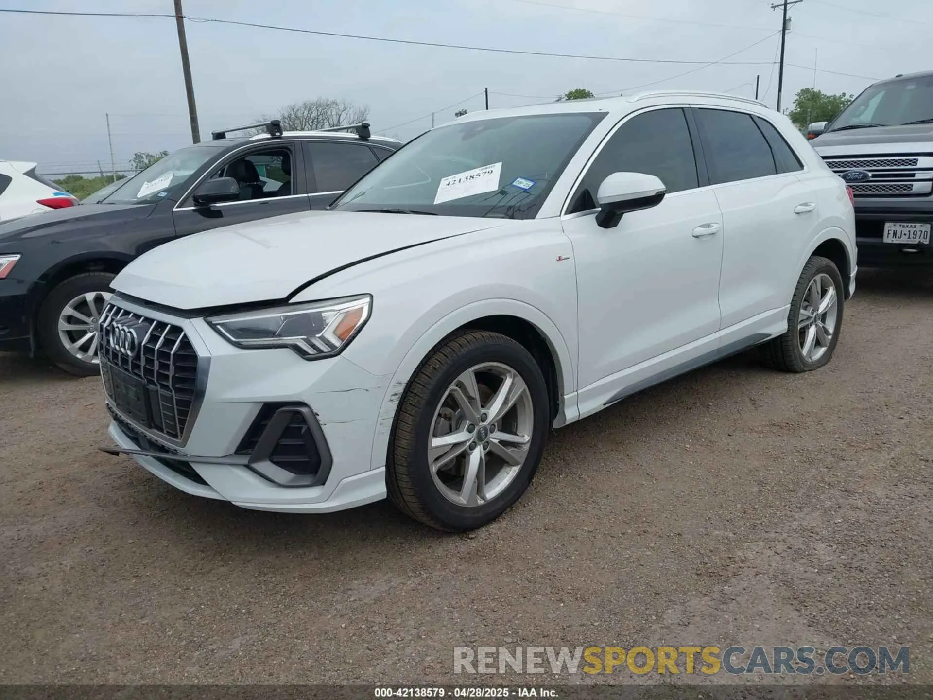 2 fotografías del automóvil dañado WA1EECF31K1067899 AUDI Q3 2019