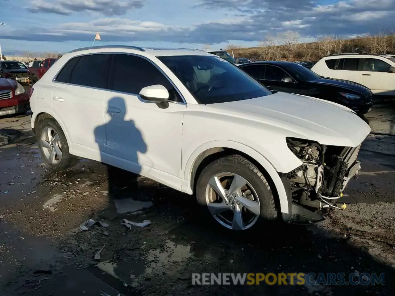 4 fotografías del automóvil dañado WA1AECF32L1038234 AUDI Q3 2020