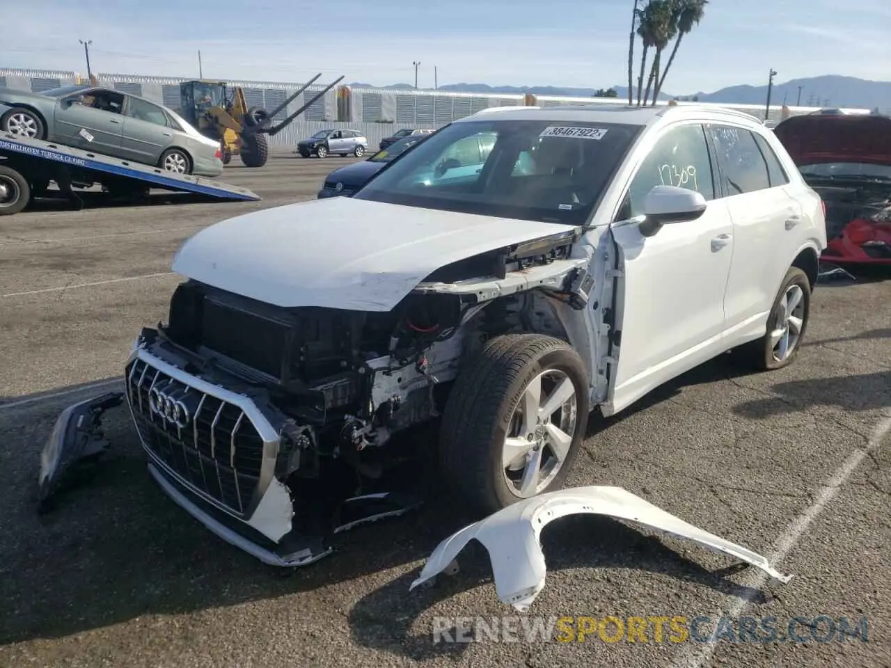 2 fotografías del automóvil dañado WA1AECF3XL1056125 AUDI Q3 2020