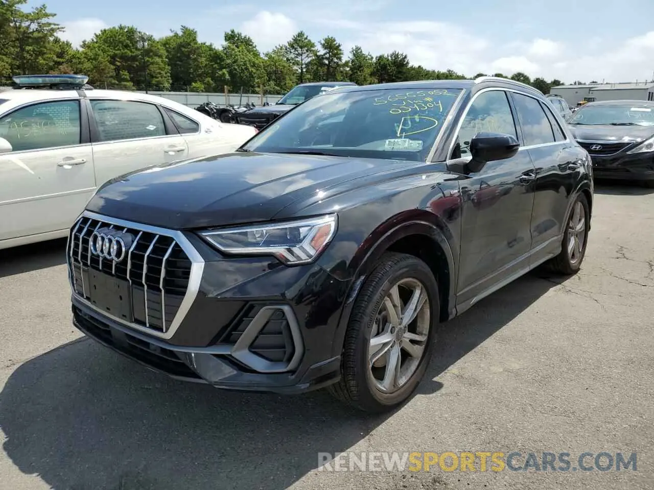 2 fotografías del automóvil dañado WA1EECF38L1034304 AUDI Q3 2020