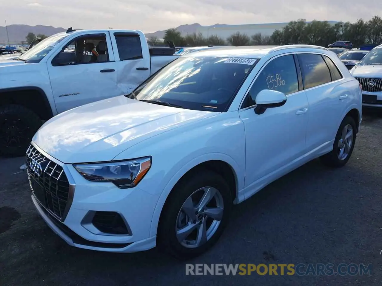 2 fotografías del automóvil dañado WA1AUCF36M1068082 AUDI Q3 2021
