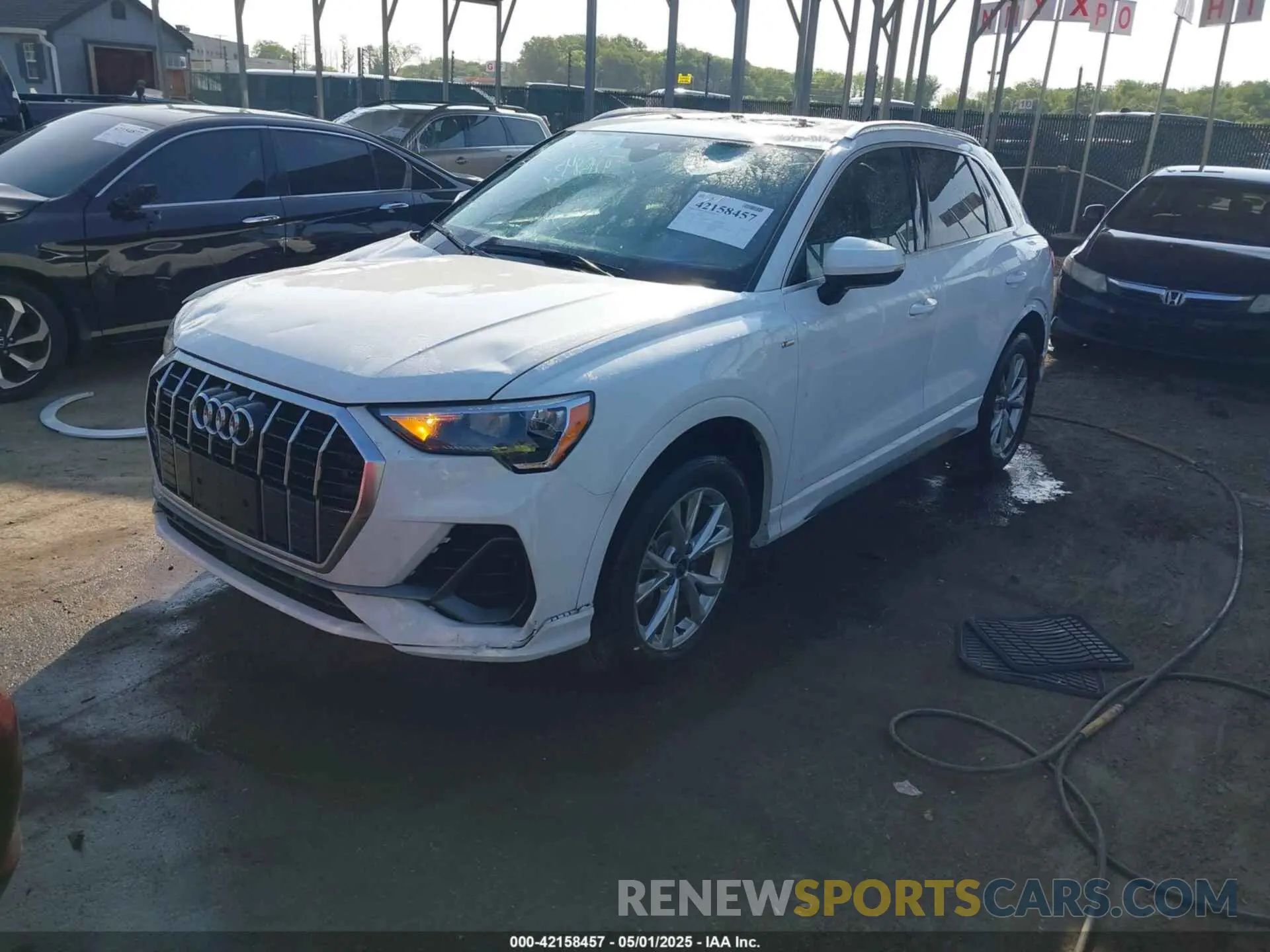 2 fotografías del automóvil dañado WA1DECF31M1037901 AUDI Q3 2021