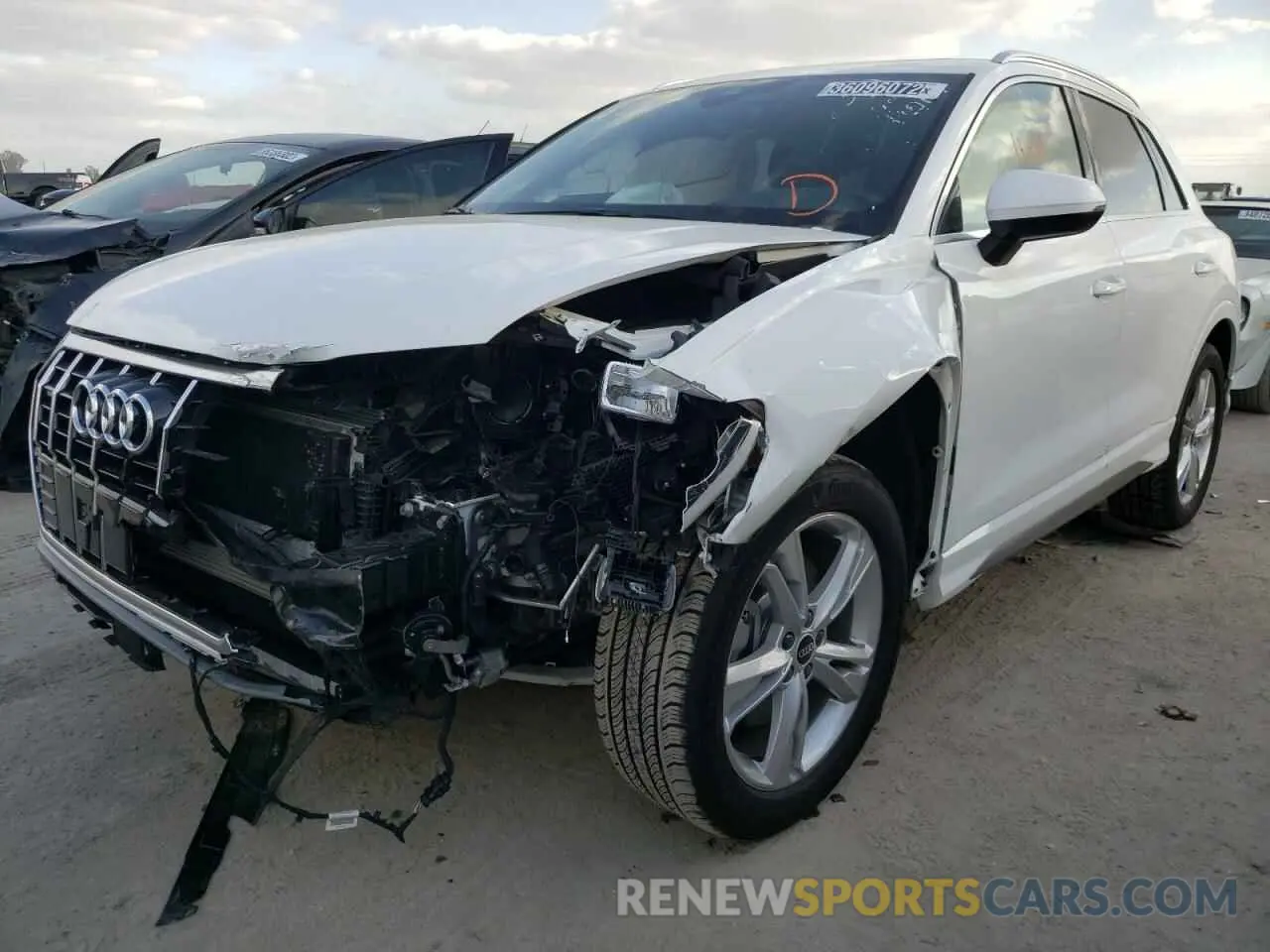 2 fotografías del automóvil dañado WA1DECF37M1022075 AUDI Q3 2021