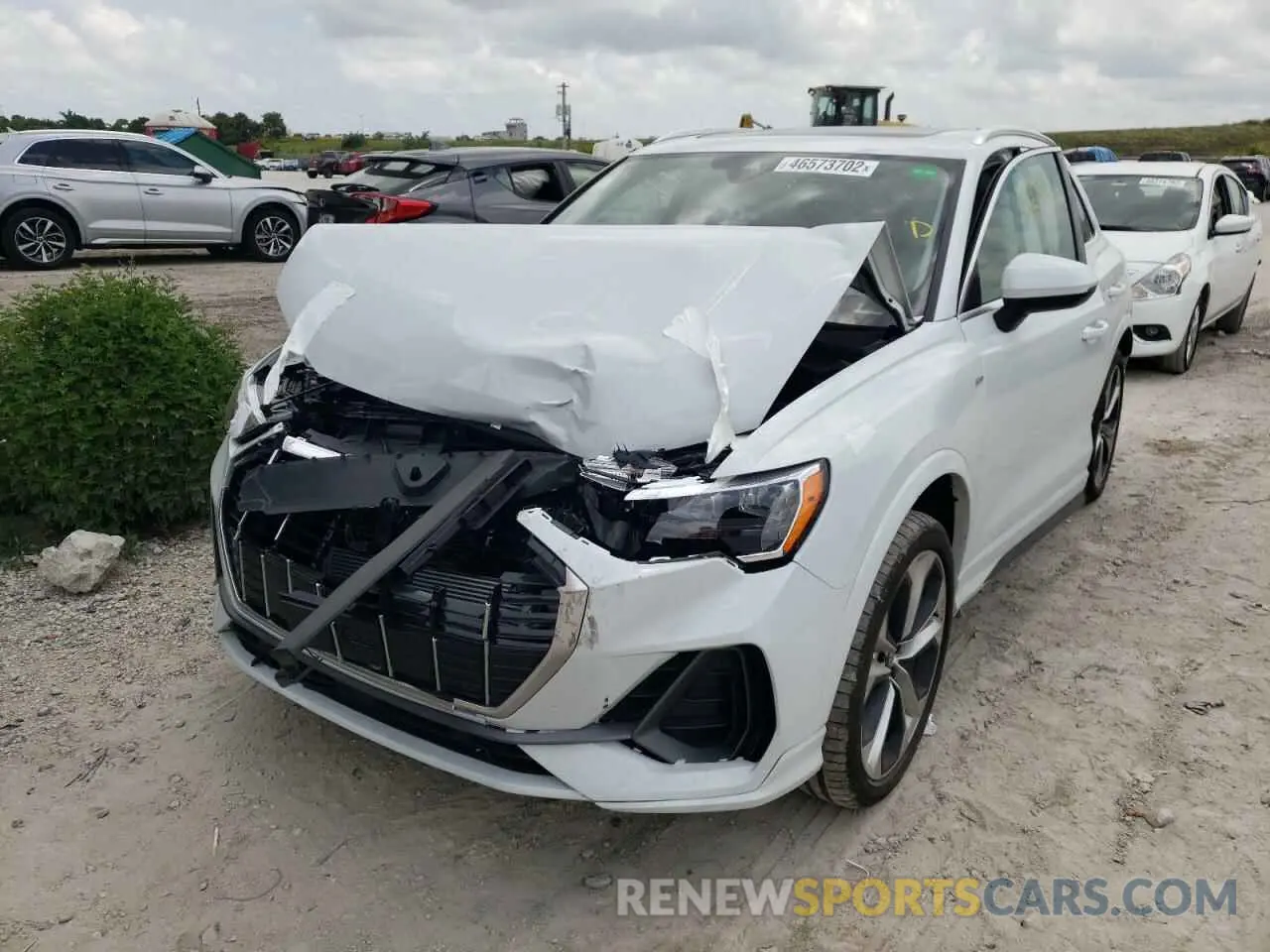 2 fotografías del automóvil dañado WA1DECF39M1153136 AUDI Q3 2021