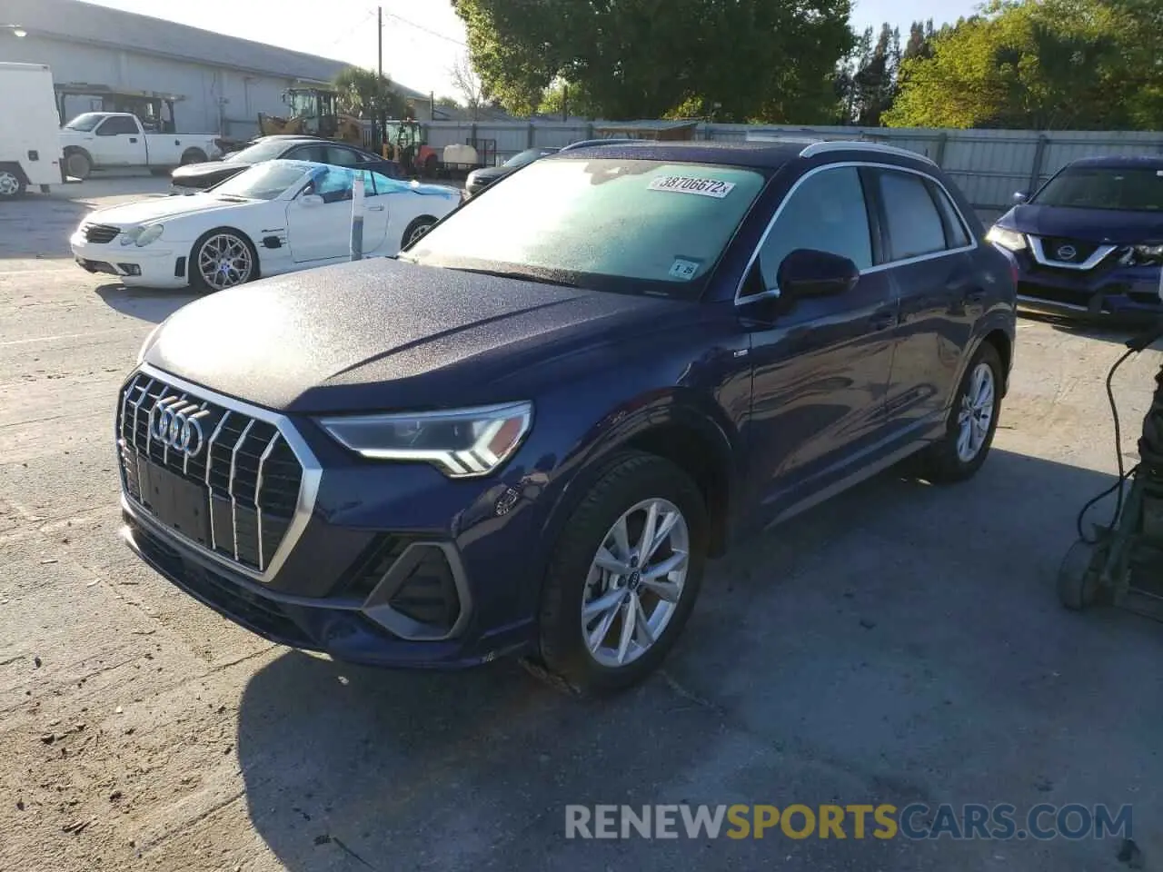 2 fotografías del automóvil dañado WA1EECF36M1024341 AUDI Q3 2021