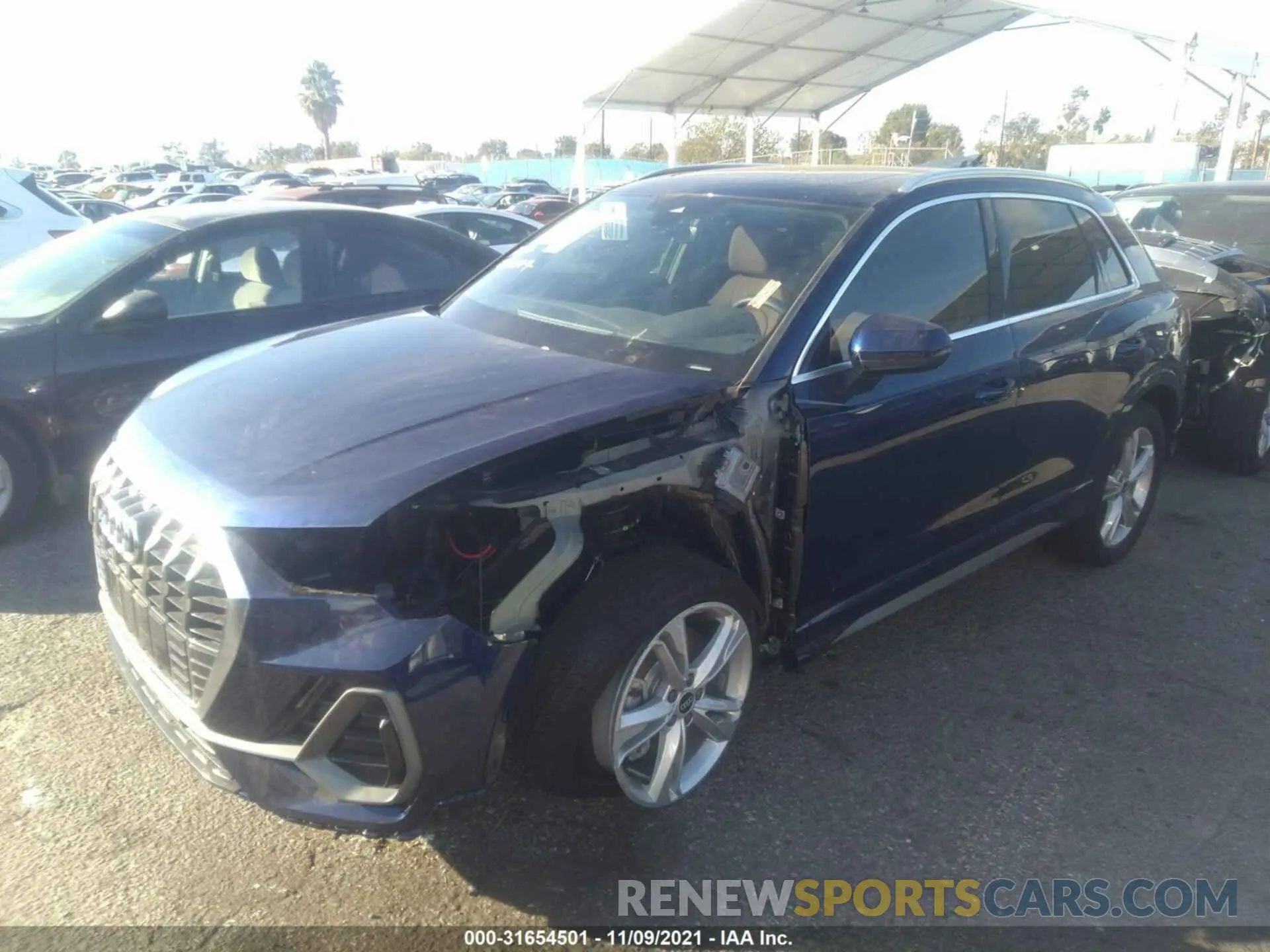 2 fotografías del automóvil dañado WA1EECF36N1004110 AUDI Q3 2022