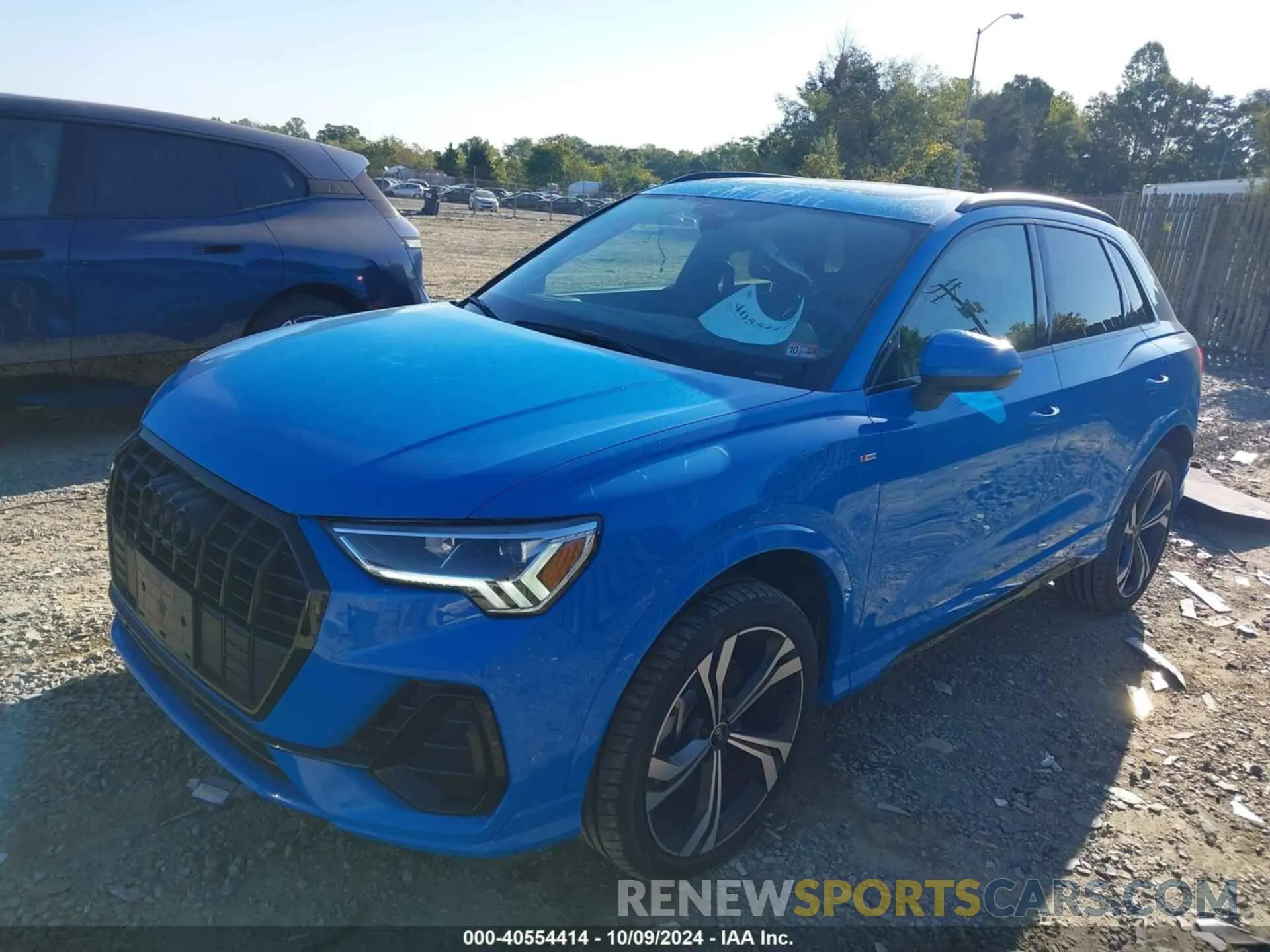 2 fotografías del automóvil dañado WA1EECF39P1035211 AUDI Q3 2023