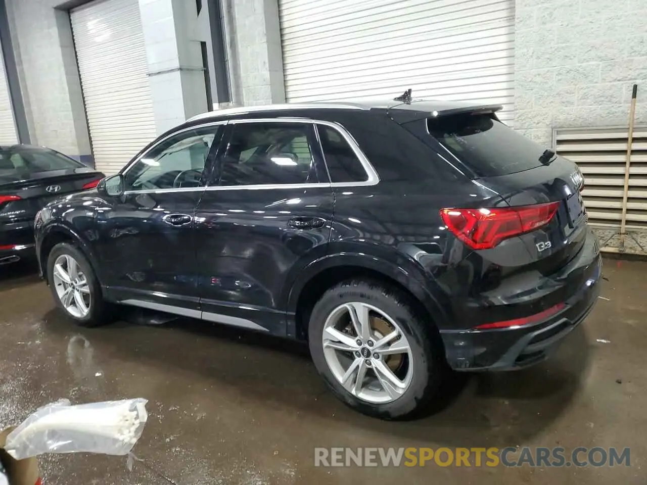 2 fotografías del automóvil dañado WA1EECF39P1075210 AUDI Q3 2023